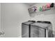 Laundry room with washer, dryer, and overhead shelving at 496 Oak View Way, Summerville, SC 29483