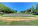 Circular park with grassy area and stone border at 496 Oak View Way, Summerville, SC 29483