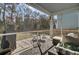 Relaxing screened porch with seating area and backyard access at 496 Oak View Way, Summerville, SC 29483