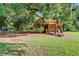 Charming treehouse playground with swings and slide at 496 Oak View Way, Summerville, SC 29483