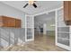 Home office with French doors opening to the kitchen and dining area at 534 Four Seasons Blvd, Summerville, SC 29486