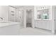 Modern bathroom with white cabinets, marble flooring, and a walk-in shower at 569 Trotters Ln # 222, Moncks Corner, SC 29461