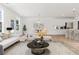 Open concept living room and kitchen with modern finishes and ample natural light at 569 Trotters Ln # 222, Moncks Corner, SC 29461