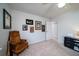 Bright bedroom with a comfortable armchair and lots of wall art at 699 Majestic Oaks Dr, Charleston, SC 29412