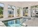 Relaxing spa with ample seating and large windows at 763 Blue Iris Way, Summerville, SC 29486
