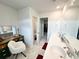 Modern bathroom with double vanity, separate toilet, and walk-in closet at 1011 Mossy Rock Dr, Summerville, SC 29485