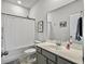 Clean bathroom with a bathtub, toilet and gray vanity with a white countertop at 1011 Mossy Rock Dr, Summerville, SC 29485