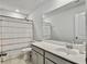 Clean and bright bathroom with a shower/tub combo and gray vanity at 1011 Mossy Rock Dr, Summerville, SC 29485