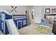 bedroom with bunk bed, slide, and plenty of storage at 1011 Mossy Rock Dr, Summerville, SC 29485