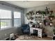 Charming coffee bar with shelving, plants and a comfy chair at 1011 Mossy Rock Dr, Summerville, SC 29485