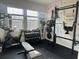 Home gym featuring exercise bike, weight bench, and free weights at 1011 Mossy Rock Dr, Summerville, SC 29485