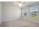 Spacious bedroom with ceiling fan and windows at 113 Corvus St, Summerville, SC 29483