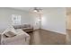 Living room with sectional sofa and ceiling fan at 113 Corvus St, Summerville, SC 29483