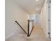 Upstairs hallway with carpeted floor and railing at 113 Corvus St, Summerville, SC 29483