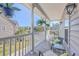 Relaxing porch with wooden floor, white railings, and comfy seating at 140 Pavilion St, Summerville, SC 29483