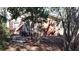 Brick ranch house with mature landscaping and a partially visible front porch at 153 Davis Ter, Saint George, SC 29477