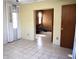 Living room with tile floors and access to other rooms at 153 Davis Ter, Saint George, SC 29477