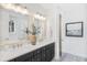 Elegant bathroom with dual vanities, quartz countertop, and designer finishes at 1695 Cultivation Lane St # 463, Mount Pleasant, SC 29466