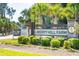 Liberty Hill Farm entrance sign with landscaping and palm trees at 1695 Cultivation Lane St # 463, Mount Pleasant, SC 29466