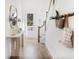 Bright entryway with hardwood floors, stairs, and a console table at 1695 Cultivation Lane St # 463, Mount Pleasant, SC 29466