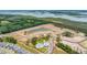 Aerial view of new construction community featuring a lagoon, pool, and homes at 1726 Cultivation Ln # 534, Mount Pleasant, SC 29466