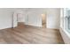 Spacious bedroom with hardwood floors and access to bathroom at 1726 Cultivation Ln # 534, Mount Pleasant, SC 29466