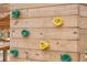 Close-up of a colorful climbing wall on a playground at 1726 Cultivation Ln # 534, Mount Pleasant, SC 29466