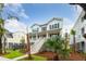 Two-story white house with a large front porch and landscaping at 1726 Cultivation Ln # 534, Mount Pleasant, SC 29466