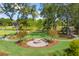 Community park with fire pit, walking paths, and landscaping at 1726 Cultivation Ln # 534, Mount Pleasant, SC 29466