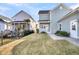 View of backyard, showing two houses and grassy area at 1820 Agate Bay Dr, Mount Pleasant, SC 29466