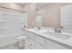 Bathroom boasts double vanity, white cabinets, and shower/tub combo at 1820 Agate Bay Dr, Mount Pleasant, SC 29466