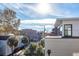View from above of a city street with houses, trees, and a clear blue sky at 195 Saint Philip St, Charleston, SC 29403