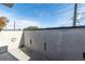 Private balcony with concrete wall and city views at 195 Saint Philip St, Charleston, SC 29403