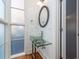 Updated bathroom with glass sink and decorative mirror at 195 Saint Philip St, Charleston, SC 29403