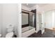 Bathroom with shower/tub combo and dark tile floors at 195 Saint Philip St, Charleston, SC 29403