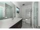 Modern bathroom with white subway tile and a glass shower at 195 Saint Philip St, Charleston, SC 29403