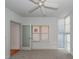 Bright bedroom with ceiling fan and large windows at 195 Saint Philip St, Charleston, SC 29403