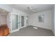 Bright bedroom with hardwood floors, a ceiling fan and access to a private bathroom at 195 Saint Philip St, Charleston, SC 29403