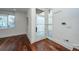 Modern entryway with hardwood floors and frosted glass door at 195 Saint Philip St, Charleston, SC 29403