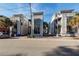 Three-story townhouses with street parking at 195 Saint Philip St, Charleston, SC 29403
