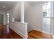 Bright hallway with hardwood floors and modern wall finishes at 195 Saint Philip St, Charleston, SC 29403