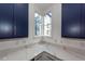 Kitchen corner with white cabinets and quartz countertops at 195 Saint Philip St, Charleston, SC 29403