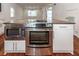Modern kitchen island with stainless steel appliances at 195 Saint Philip St, Charleston, SC 29403