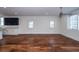 Spacious living room featuring hardwood floors and an open floor plan at 195 Saint Philip St, Charleston, SC 29403