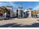 Three modern townhouses with sleek design and private entrances at 195 Saint Philip St, Charleston, SC 29403