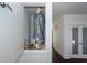 Utility closet with water heater and additional storage space at 195 Saint Philip St, Charleston, SC 29403