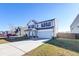 Two-story home with white siding, gray accents, and a two-car garage at 315 Silent Bluff Dr, Summerville, SC 29486