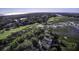 Aerial view of waterfront property with golf course and marsh views at 32 Marsh Island (4 Shares) Ln, Isle of Palms, SC 29451