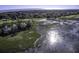 Wide shot of community, golf course and ocean at 32 Marsh Island (4 Shares) Ln, Isle of Palms, SC 29451