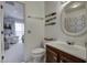 Bathroom with toilet, sink, and decorative fish at 32 Marsh Island (4 Shares) Ln, Isle of Palms, SC 29451